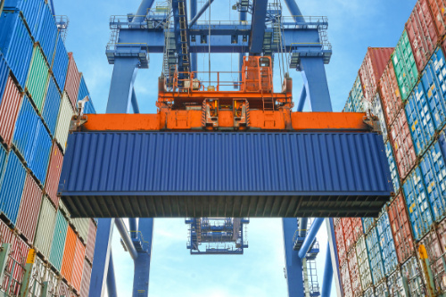 Cargo container being lifted